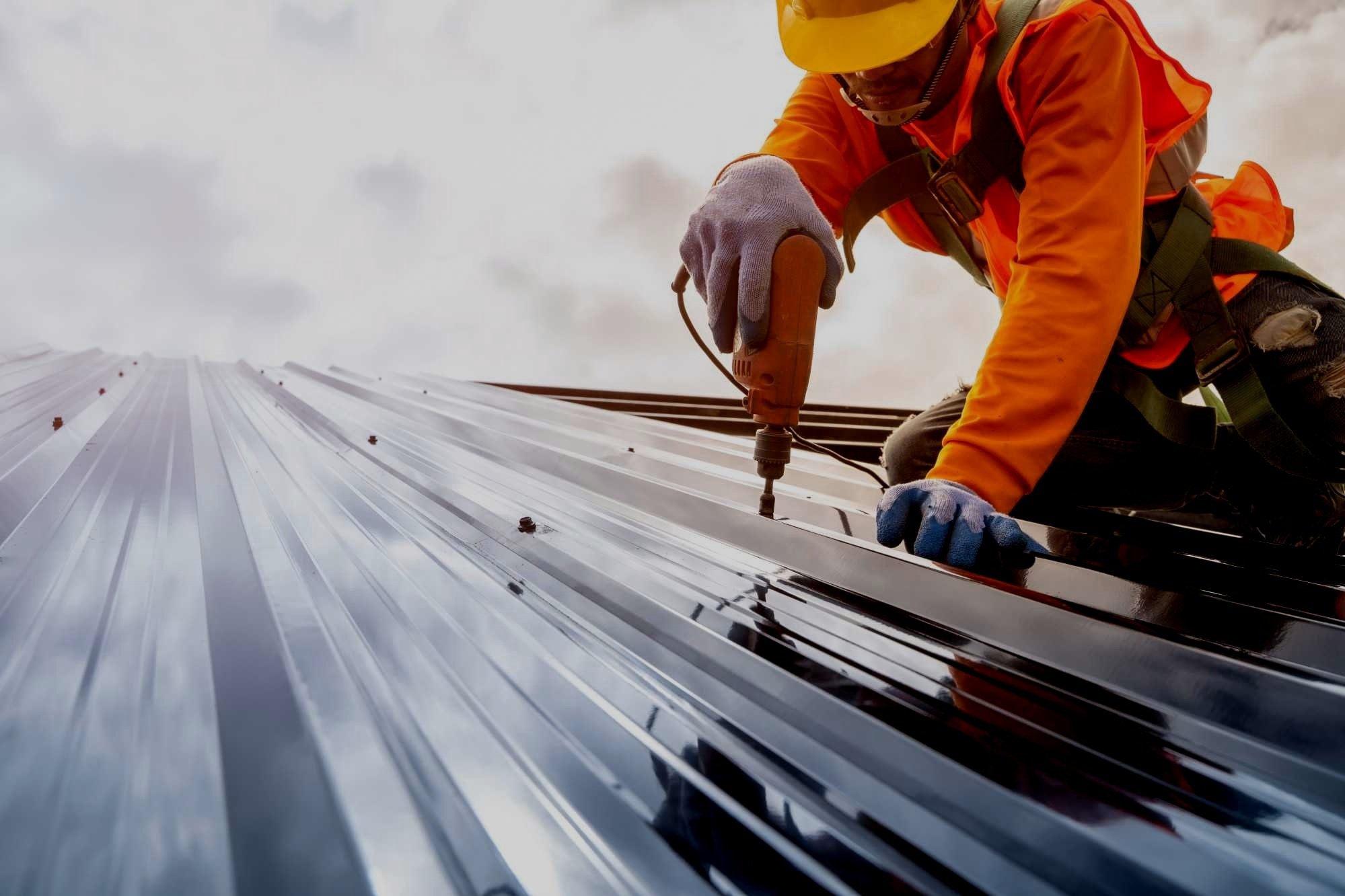 Commercial metal roof prepared for restoration work