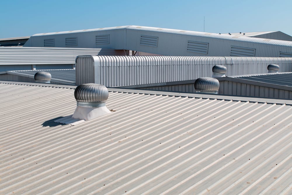 Industrial metal roof with roof ventilation